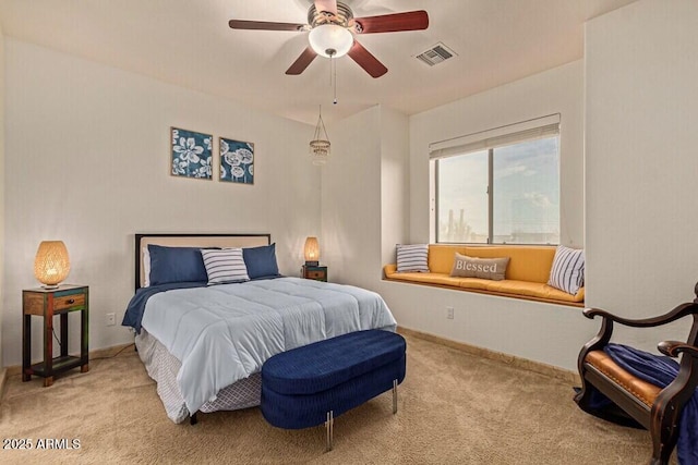 bedroom featuring baseboards, visible vents, and carpet floors