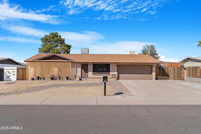 1604 W Kerry Ln, Phoenix, AZ 85027 - single story home featuring driveway, a garage, and fence