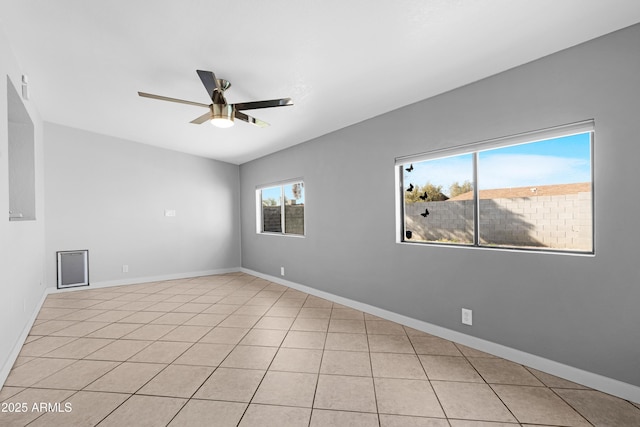 1604 W Kerry Ln, Phoenix, AZ 85027 - empty room with light tile patterned floors, baseboards, and ceiling fan