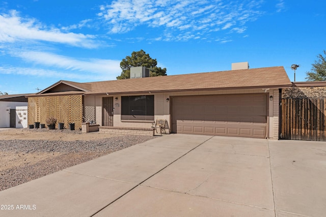 1604 W Kerry Ln, Phoenix, AZ 85027 - ranch-style home featuring brick siding, driveway, a garage, and fence