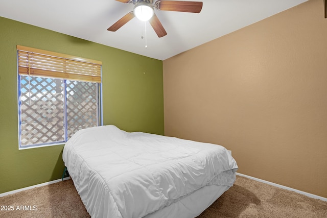 1604 W Kerry Ln, Phoenix, AZ 85027 - bedroom with baseboards, carpet floors, and ceiling fan