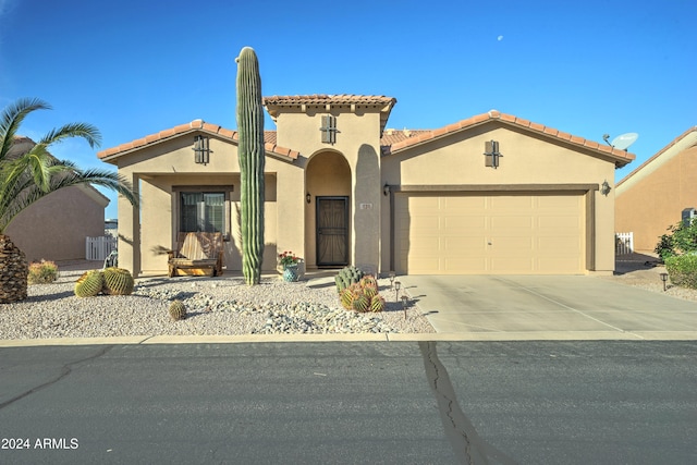 view of front of home with a garage