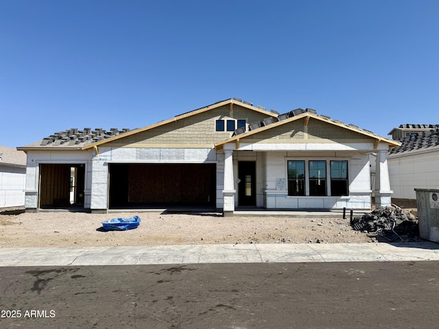 6452 E Omega Cir, Mesa, AZ 85215 - property in mid-construction featuring an attached garage and a porch