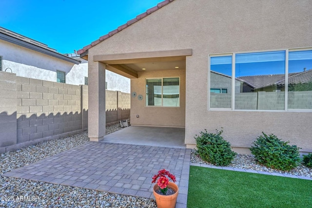 view of patio / terrace with fence