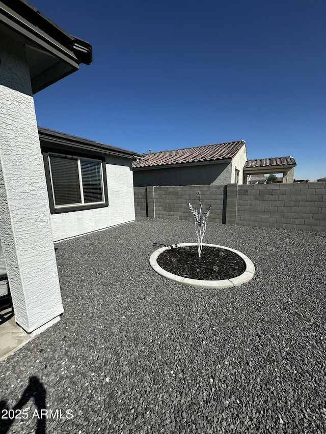 view of yard with fence