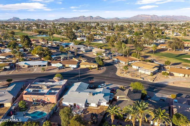 drone / aerial view with a mountain view and a residential view