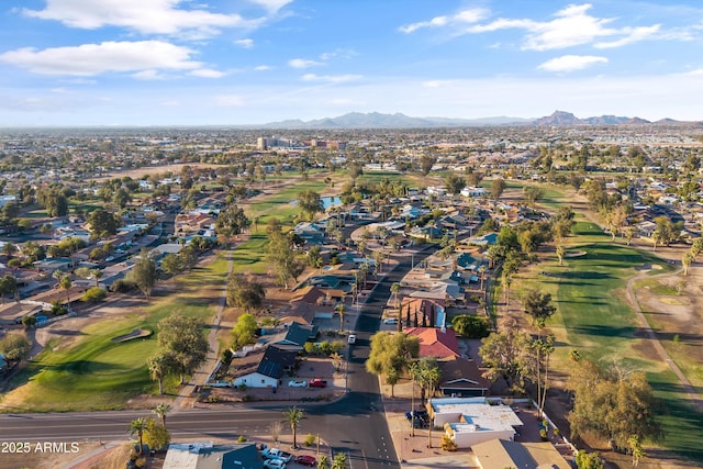 bird's eye view featuring a mountain view, a residential view, and view of golf course