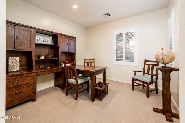 home office featuring light colored carpet