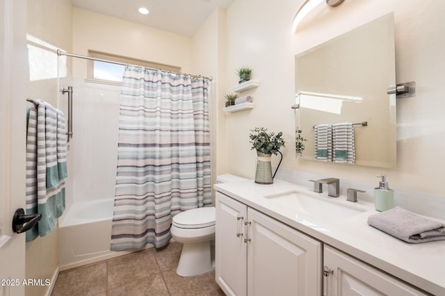 full bathroom featuring toilet, vanity, tile patterned flooring, and shower / bathtub combination with curtain