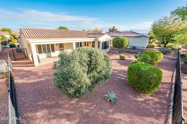 back of property featuring a patio area