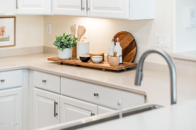 interior details featuring white cabinets