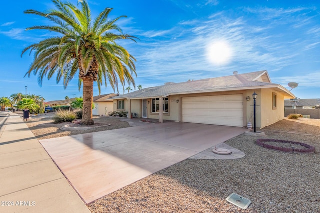 single story home featuring a garage