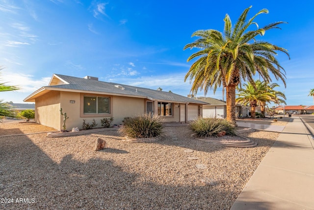 ranch-style home with a garage