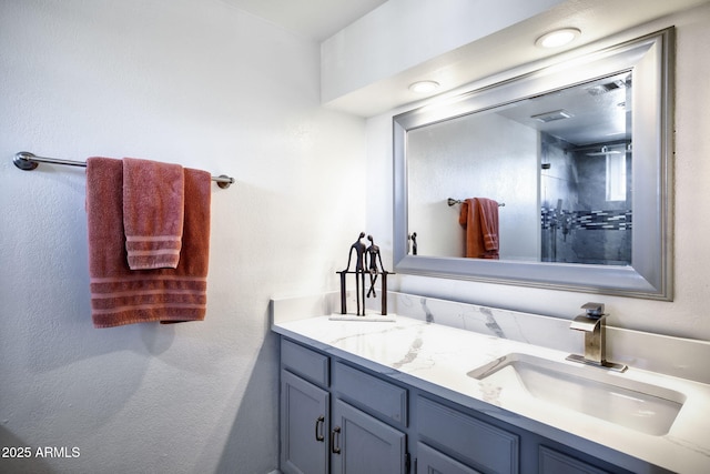 1211 N Miller Rd Unit 257, Scottsdale, AZ 85257 - bathroom with double vanity and a shower