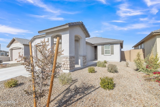 view of front of property with a garage