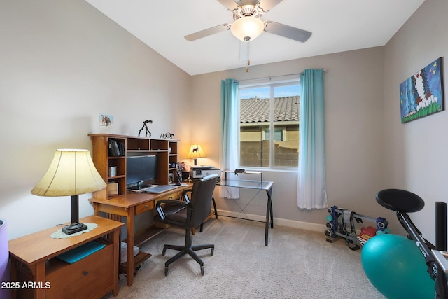 office with ceiling fan, lofted ceiling, and light carpet