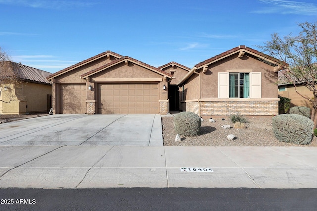 single story home featuring a garage