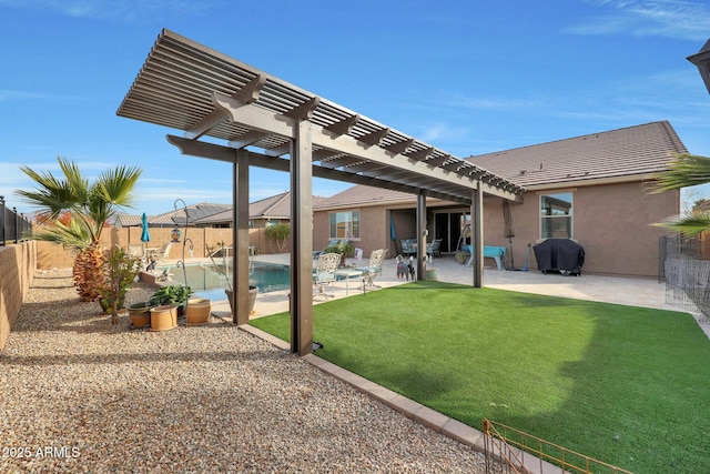 view of yard with a fenced in pool, a patio, and a pergola