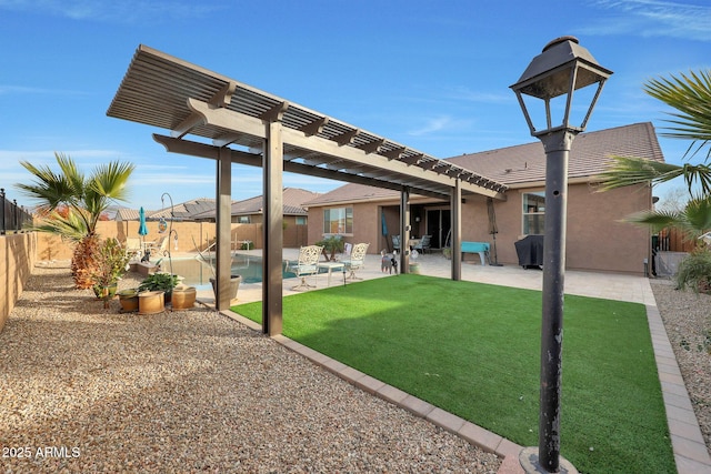 view of yard featuring a fenced in pool, a pergola, and a patio