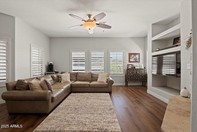 20121 N 76th St Unit 2006, Scottsdale, AZ 85255 - living area featuring a ceiling fan, dark wood-style flooring, and baseboards
