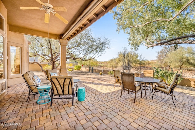 view of patio with ceiling fan