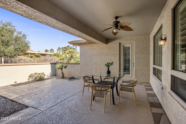 view of patio with ceiling fan