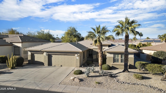 ranch-style house featuring a garage