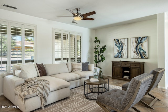 living room with ceiling fan