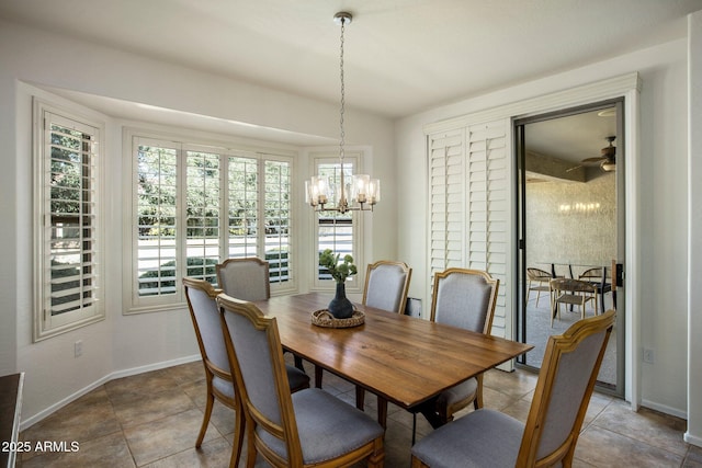 dining area with a notable chandelier