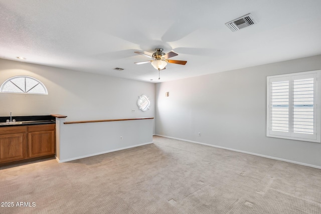 11217 E Laurel Ln, Scottsdale, AZ 85259 - empty room with ceiling fan and light colored carpet