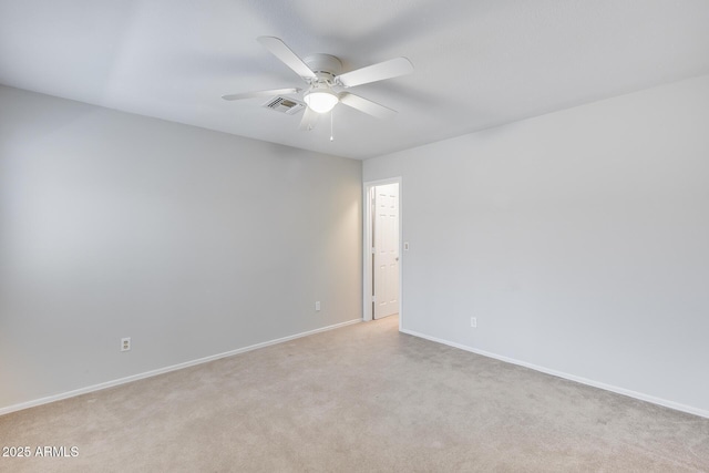 11217 E Laurel Ln, Scottsdale, AZ 85259 - empty room featuring a ceiling fan and light colored carpet