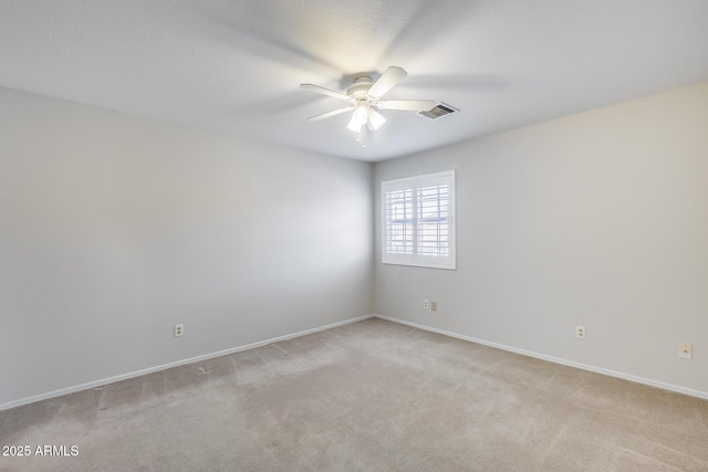 11217 E Laurel Ln, Scottsdale, AZ 85259 - empty room with a ceiling fan and light carpet