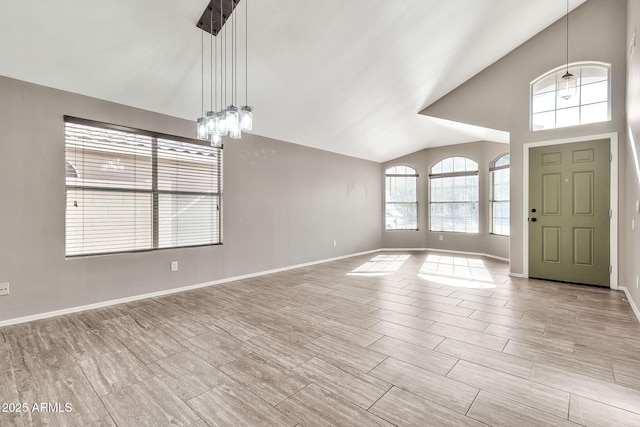 entryway with high vaulted ceiling