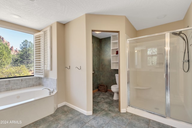 bathroom featuring toilet, a textured ceiling, tile patterned flooring, and plus walk in shower