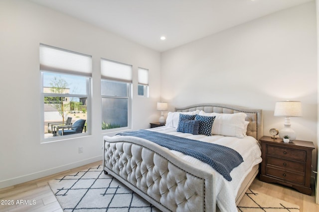 bedroom with light wood-type flooring