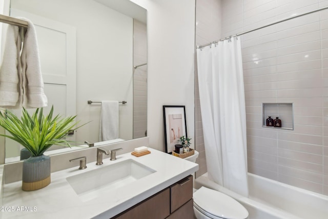 full bathroom featuring vanity, toilet, and shower / bath combo with shower curtain