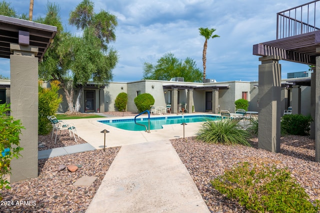 view of pool featuring a patio area and a pergola