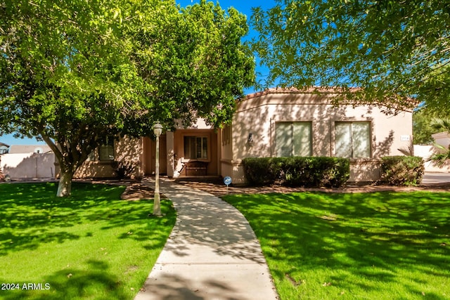 2914 E Gary Way, Phoenix, AZ 85042 - view of front of home with stucco siding and a front yard