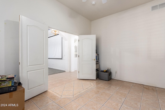 spare room with light tile patterned floors