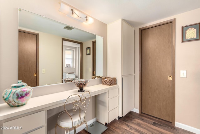 bathroom with vanity and wood-type flooring