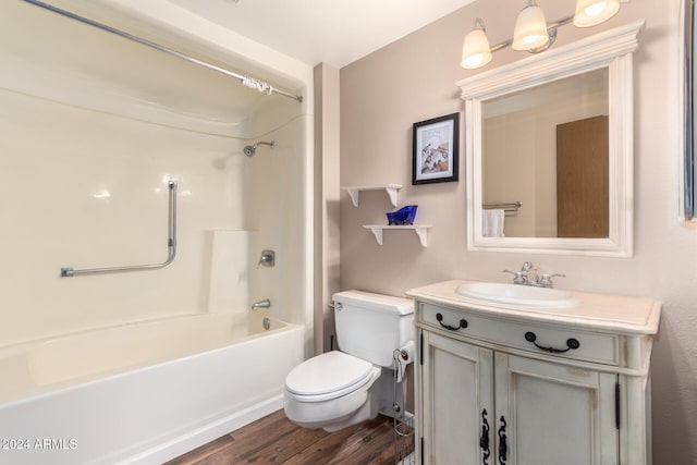 full bathroom with shower / bath combination, vanity, toilet, and wood-type flooring