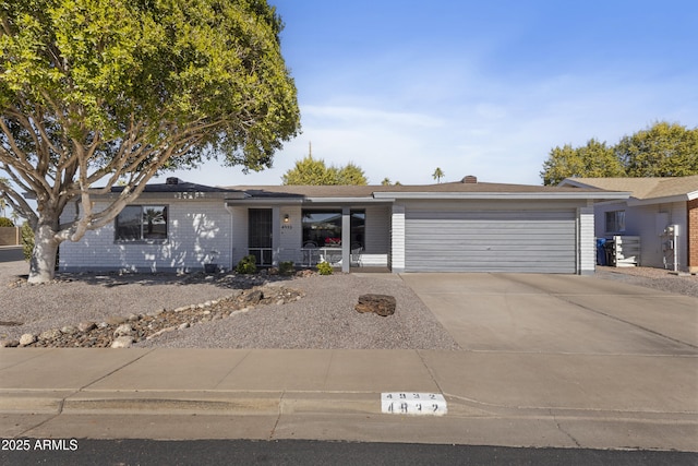 single story home featuring a garage