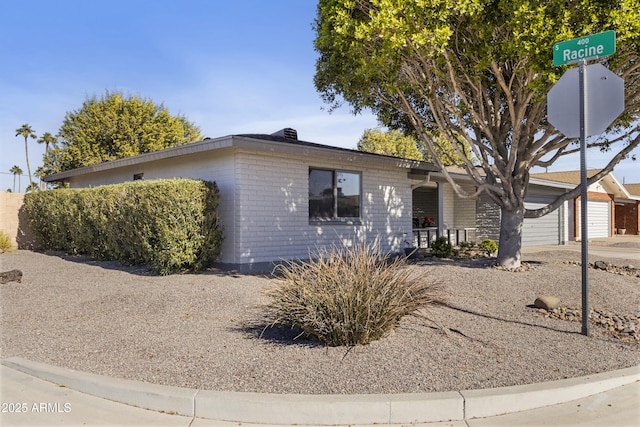 ranch-style home with a garage