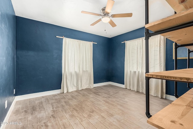 738 S Pomeroy, Mesa, AZ 85210 - unfurnished bedroom with wood finished floors, baseboards, and ceiling fan
