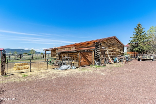 1551 Mormon Lake Rd, Mormon Lake, AZ 86038 - view of outbuilding featuring an outdoor structure, an exterior structure, and a mountain view