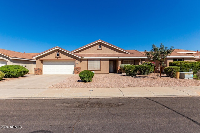 1147 N Marvin St, Gilbert, AZ 85233 - ranch-style home featuring stucco siding, a garage, concrete driveway, and a tiled roof