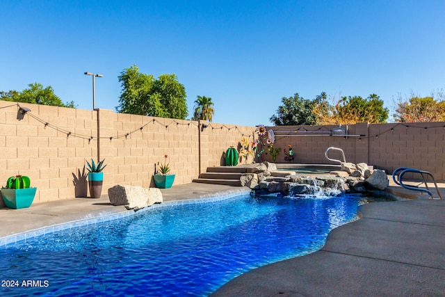 1147 N Marvin St, Gilbert, AZ 85233 - view of pool featuring a fenced backyard and a pool with connected hot tub