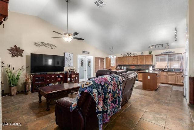 1147 N Marvin St, Gilbert, AZ 85233 - living room featuring lofted ceiling and a ceiling fan