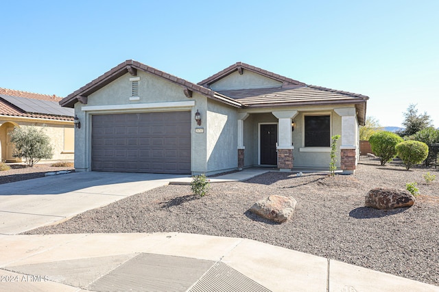 view of front of home featuring a garage