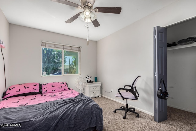 bedroom with ceiling fan and carpet